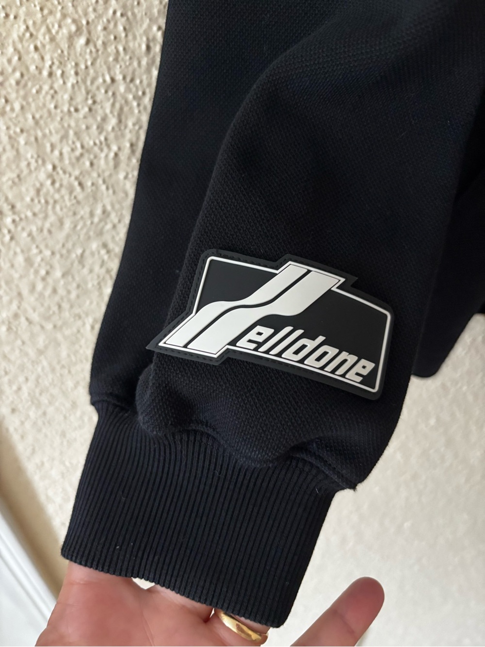 Men's Black V-Neck Sweater with White Geometric Accents - Picture 3 of 7